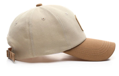 Vintage baseballkasket med broderet C-bogstav | Tofarvet design, justerbar rem, unisex til mænd og kvinder