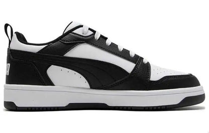 Baskets Puma Rebound V6 Low, modèle noir et blanc, 392328-01.