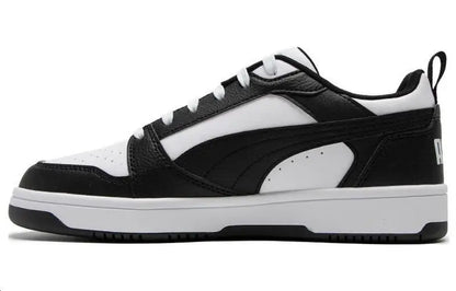 Baskets Puma Rebound V6 Low, modèle noir et blanc, 392328-01.